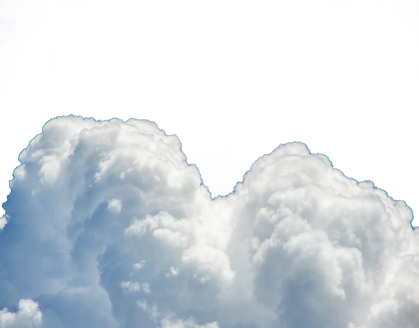 Clouds against a deep blue sky