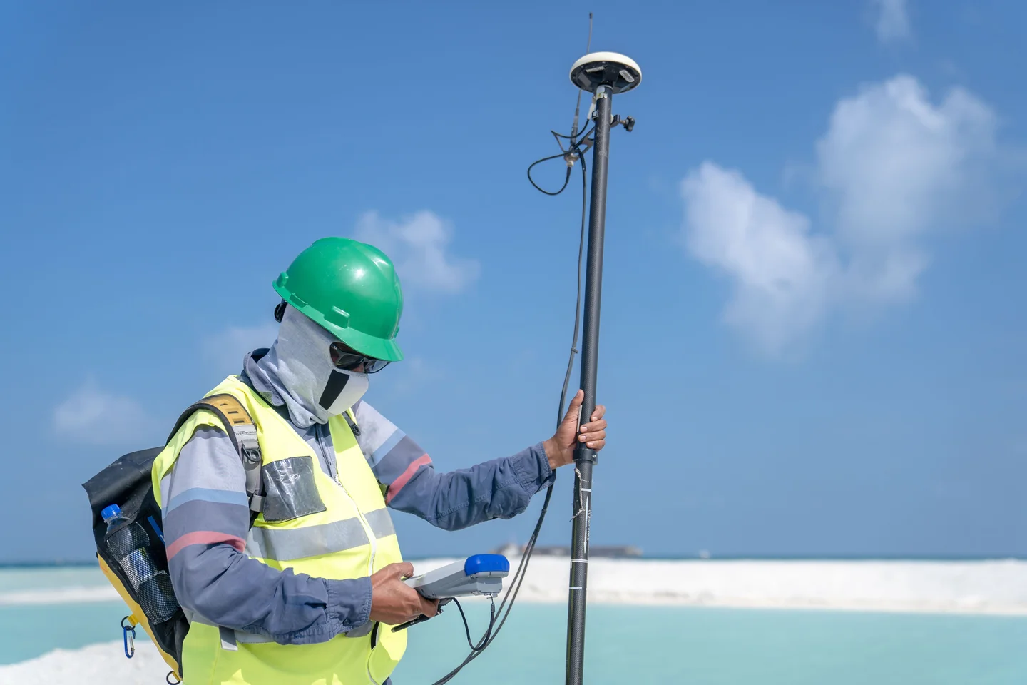 Engineer surveying telecommunications infrastructure