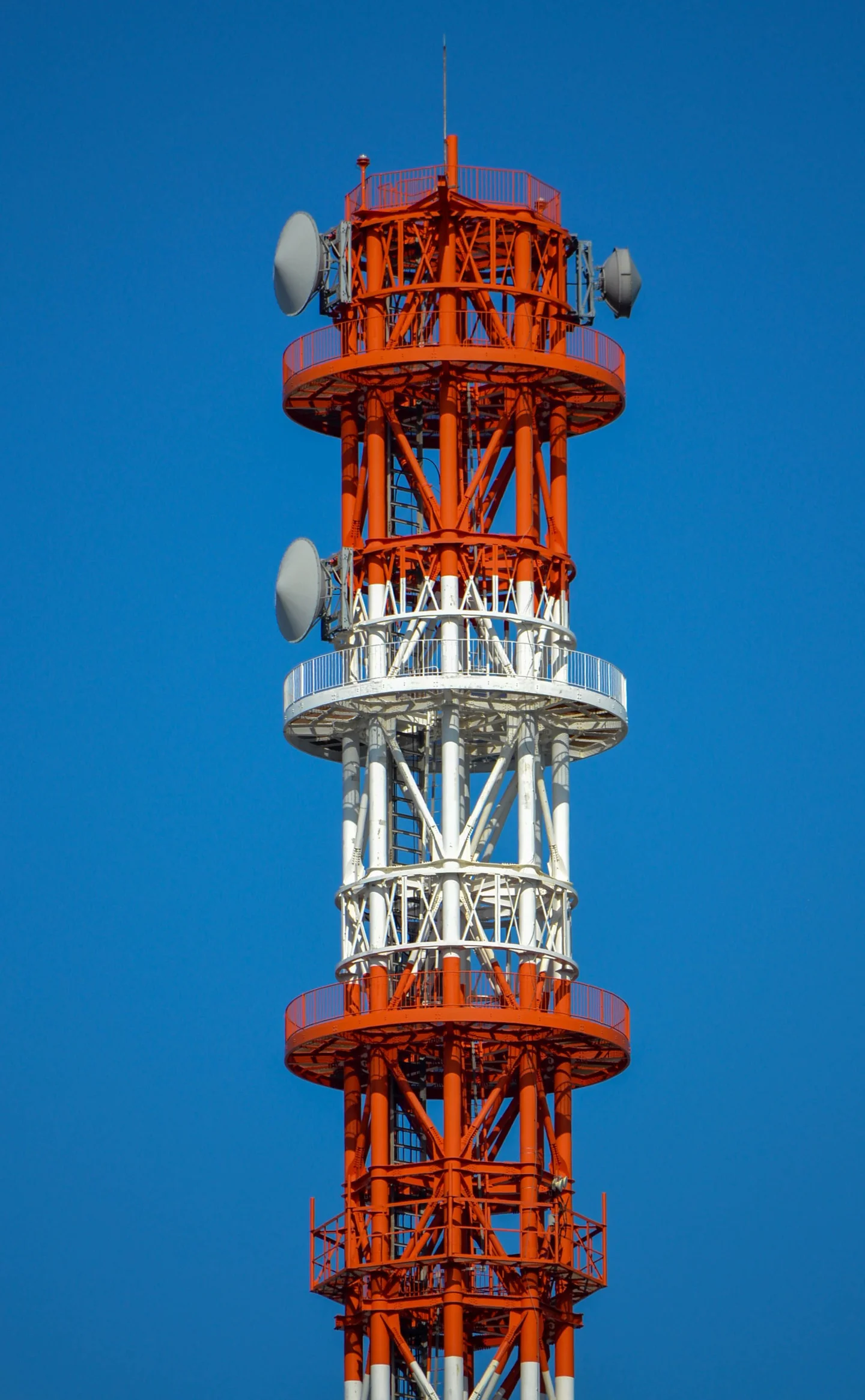Telecommunications tower upgrade and reinforcement